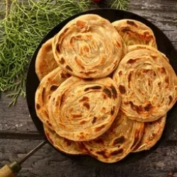 homemade-delicious-whole-wheat-paratha-260nw-2025441068 (1)